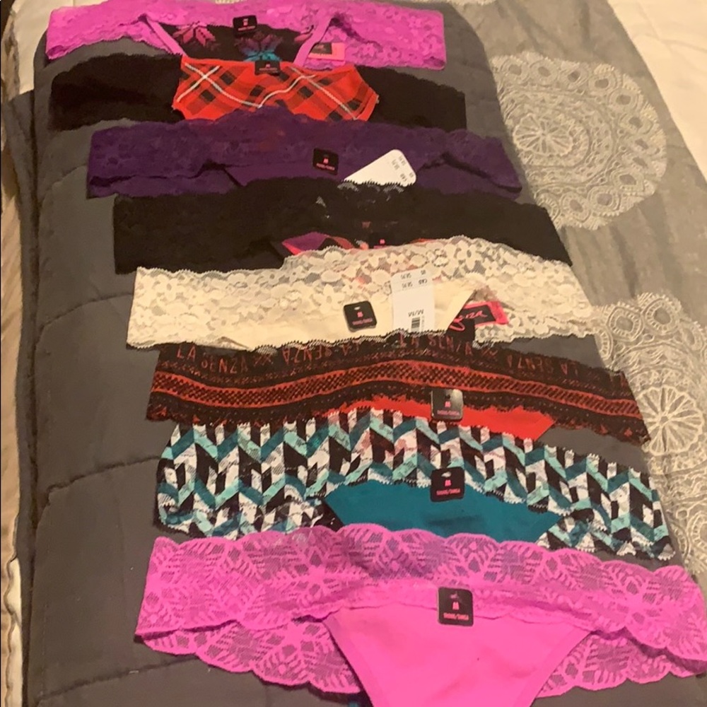 8 pair NWT med thong panties